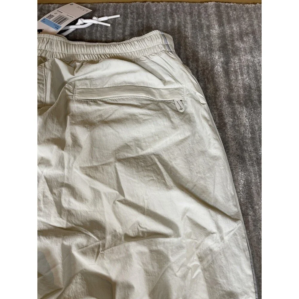 Nike Track Pants Mens Medium White Solo Swoosh Loose Fit Taper Leg Stacked New